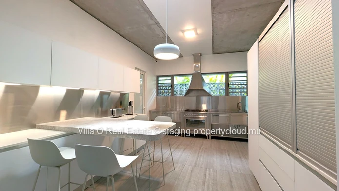 Nestled in the heart of Floreal, this architectural gem offers a modern lifestyle with an omnipresent nature that ill... (Sole Mandate)