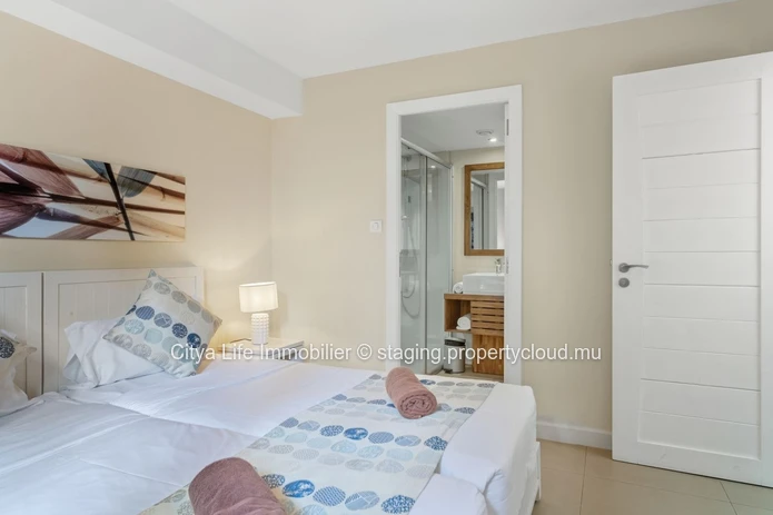 Modern Apartment with Communal Pool in Trou aux Biches - Spacious and Stylish Living for Rs