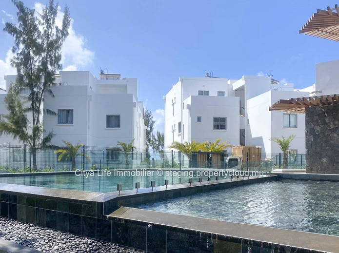 Appartement PDS à vendre à Grand Gaube, 185m², 3 chambres, piscine commune, proche écoles et magasins, meublé, climat...
