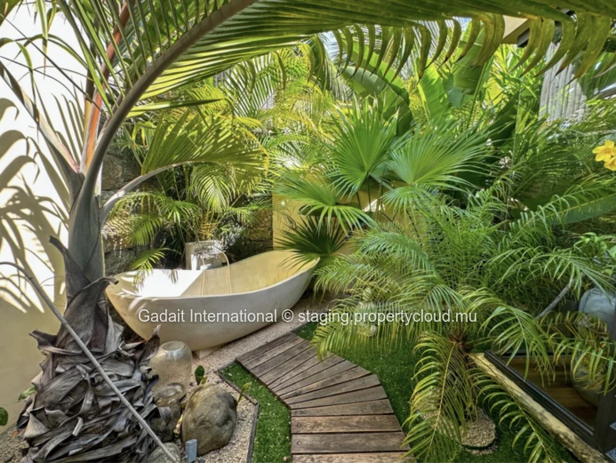 Villa tropicale de luxe avec piscine, accès bateau et prestations haut de gamme à Rivière Noire, Île Maurice