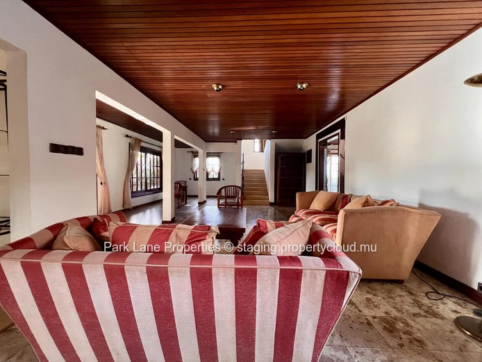 Double-storey home overlooking a magnificent pool and mature trees in Floreal