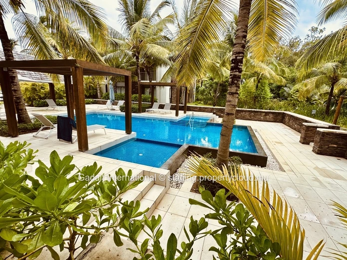 Appartement de Prestige à Montchoisy – Luxe, Sérénité et Accès Direct à la Plage
