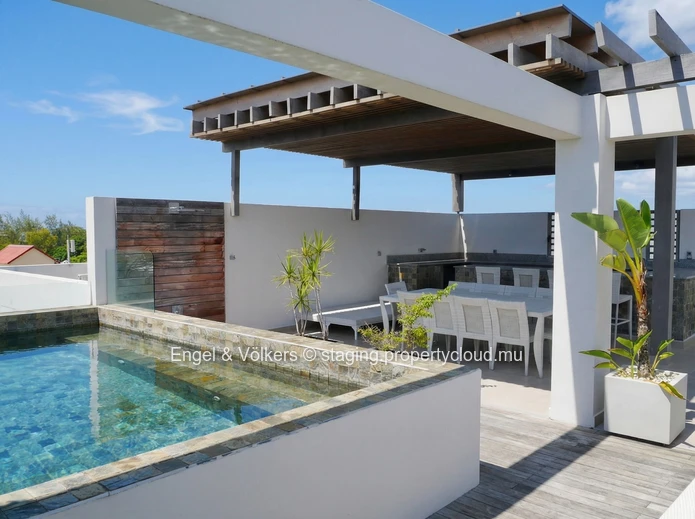 Sleek Seaside Penthouse Living, Steps from the Beach