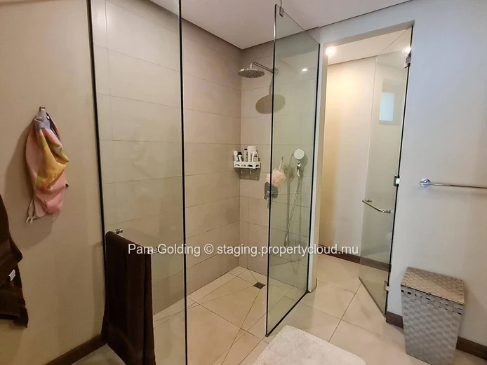 Stylish 3-Bedroom Ground-Floor Apartment for Sale in Pointe aux Canonniers - Le Savoy Complex (Sole Mandate)