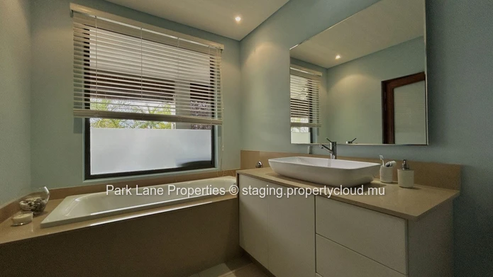 Appartement confortable de 3 chambres avec terrasse, piscine et accès à la plage à Pereybere