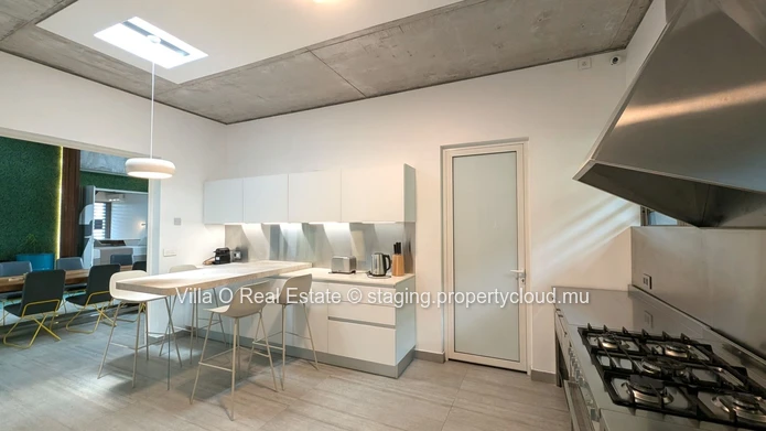 Nestled in the heart of Floreal, this architectural gem offers a modern lifestyle with an omnipresent nature that ill... (Sole Mandate)
