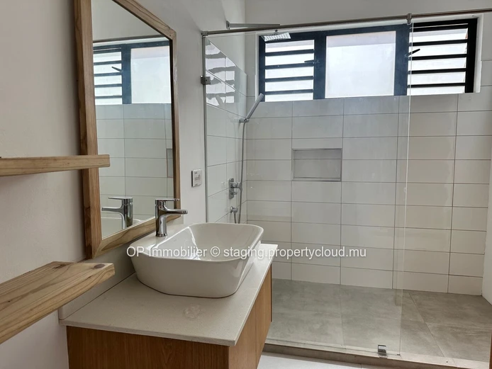 "Exquisite 4-bedroom home with private pool in Grand Baie, fully furnished, close to amenities. Price: €25M"