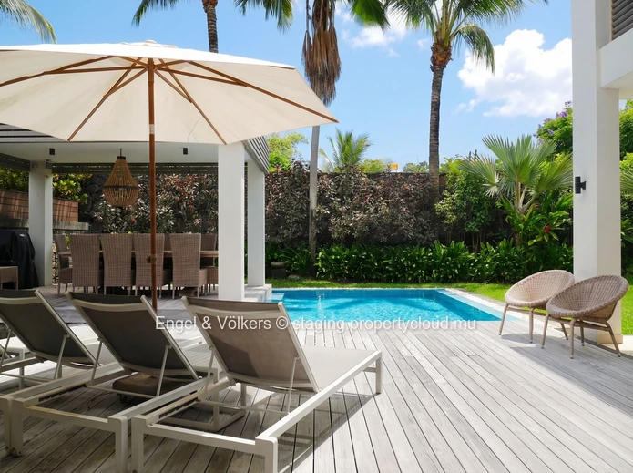 Elegant Four-Bedroom Villa with Private Beach Access