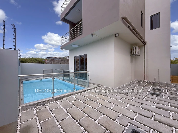 Elegant villa under construction with pool & garden