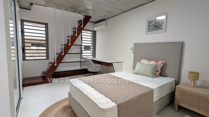 Nestled in the heart of Floreal, this architectural gem offers a modern lifestyle with an omnipresent nature that ill... (Sole Mandate)