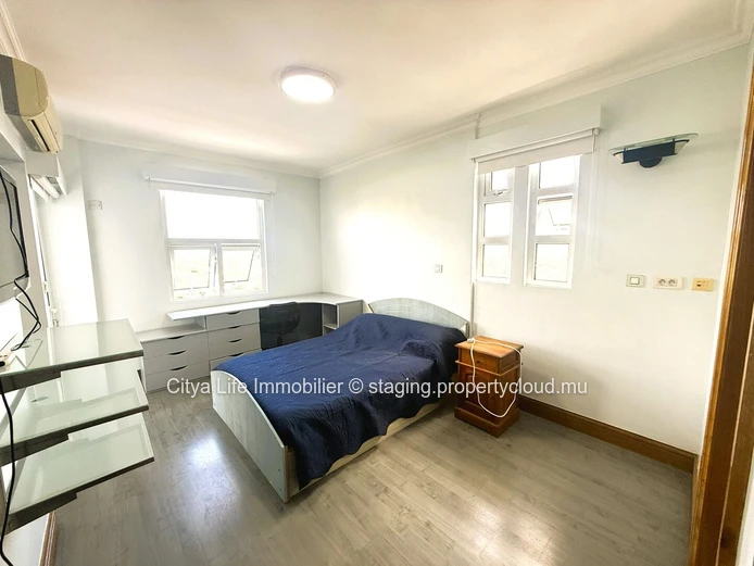 Luxurious 4-Bed penthouse in Quatre Bornes with Rooftop Access & Mountain Views.