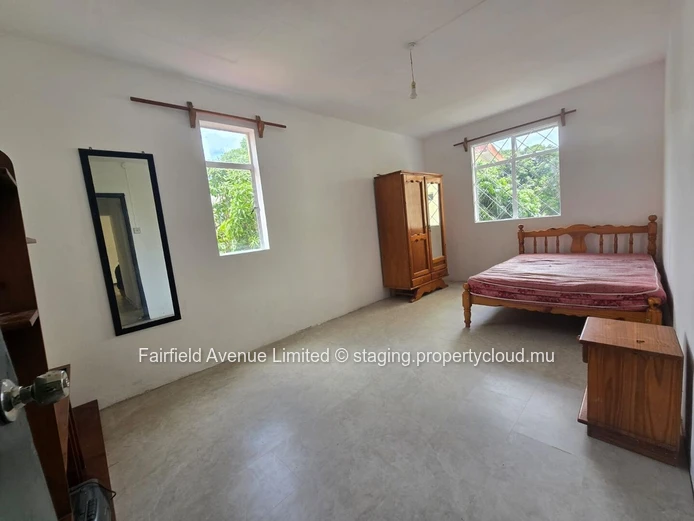 Modern Furnished Apartment in Rose Hill with Guarded Parking, Balcony, and Close to Schools and Shops - Rs 20,000/mo.