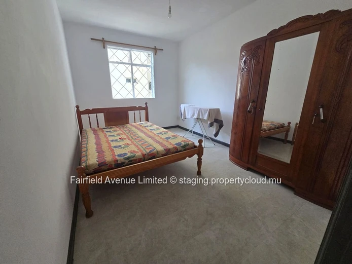 Modern Furnished Apartment in Rose Hill with Guarded Parking, Balcony, and Close to Schools and Shops - Rs 20,000/mo.