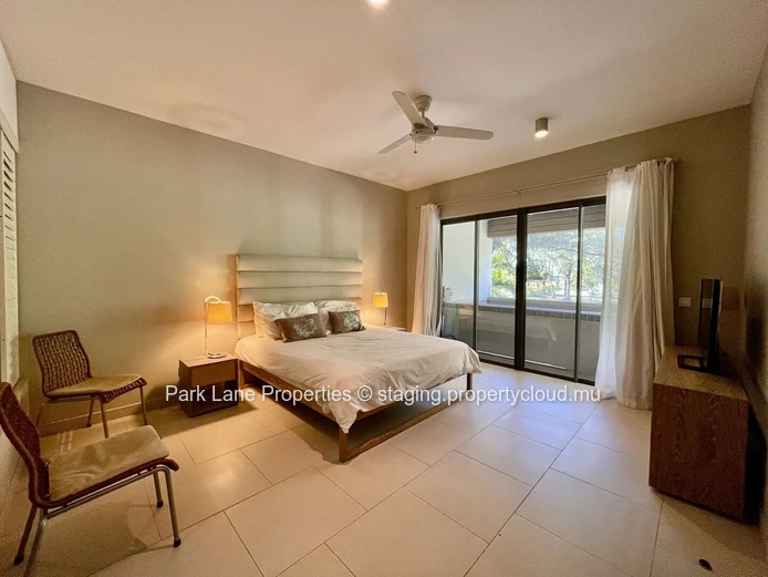 Beach access is just a short stroll from this lovely property.