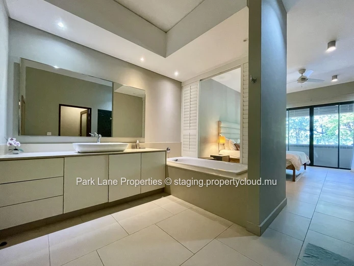 Beach access is just a short stroll from this lovely property.