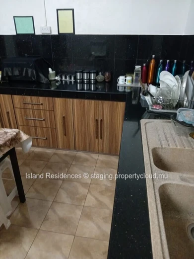 "Charming 5-Bedroom House with Large Yard in Triolet - Rs"