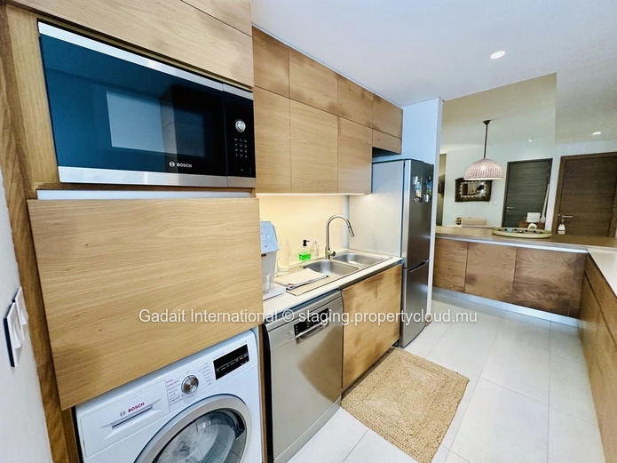 Appartement de Prestige à Montchoisy – Luxe, Sérénité et Accès Direct à la Plage
