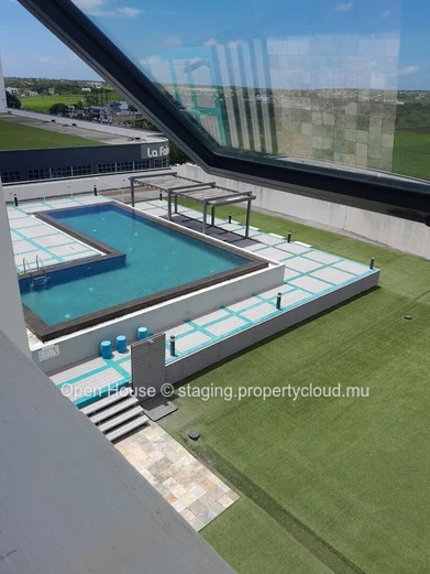Appartement RES à vendre à Grand Baie, 120m², 2 chambres, piscine commune, accessible aux étrangers, proche des comme...