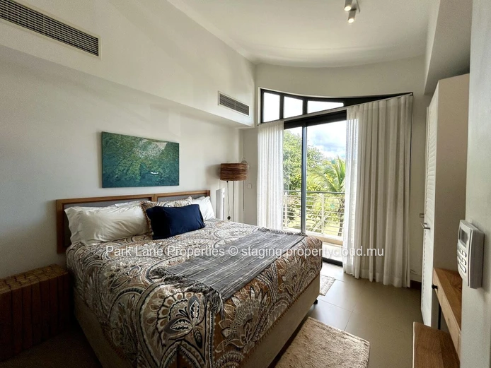 Luxurious Beachfront Apartment with Stunning Views and Communal Pool in Haute Rive, $800K