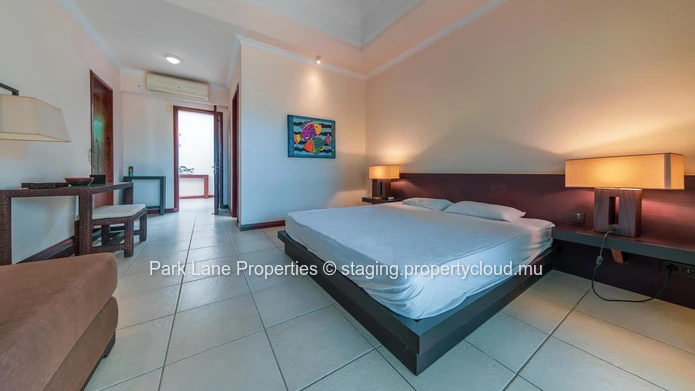 Villa de Prestige de 4 Chambres avec Piscine, Kiosk & Jardin au Tamarina Golf Estate