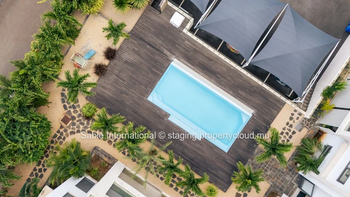 Penthouse à vendre à Tamarin, 160m², 3 chambres, piscine commune, vue mer, meublé