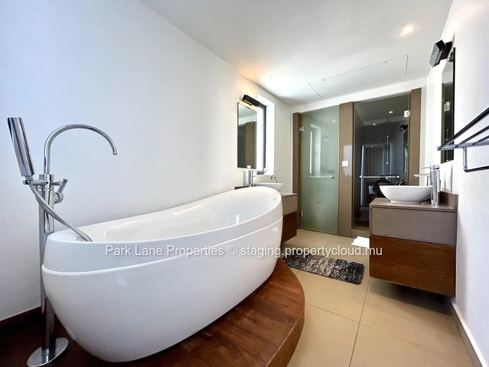 Luxurious Beachfront Apartment with Stunning Views and Communal Pool in Haute Rive, $800K