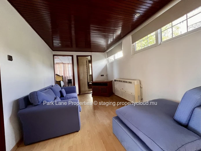 Double-storey home overlooking a magnificent pool and mature trees in Floreal