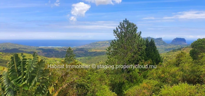 FOR SALE - This beautiful plot of land of 4 acres located in an enchanting setting in Plaine Champagne