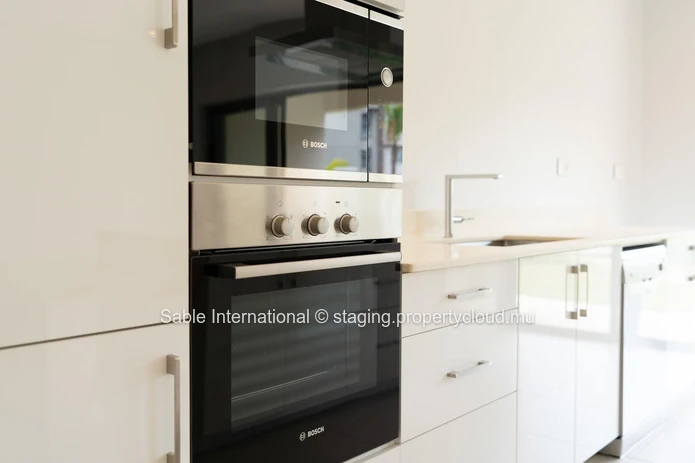 Appartement élégant avec piscine commune à Pointe aux Canonniers - Caractéristiques modernes, proche des commodités
