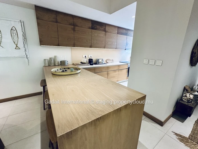 Appartement de Prestige à Montchoisy – Luxe, Sérénité et Accès Direct à la Plage