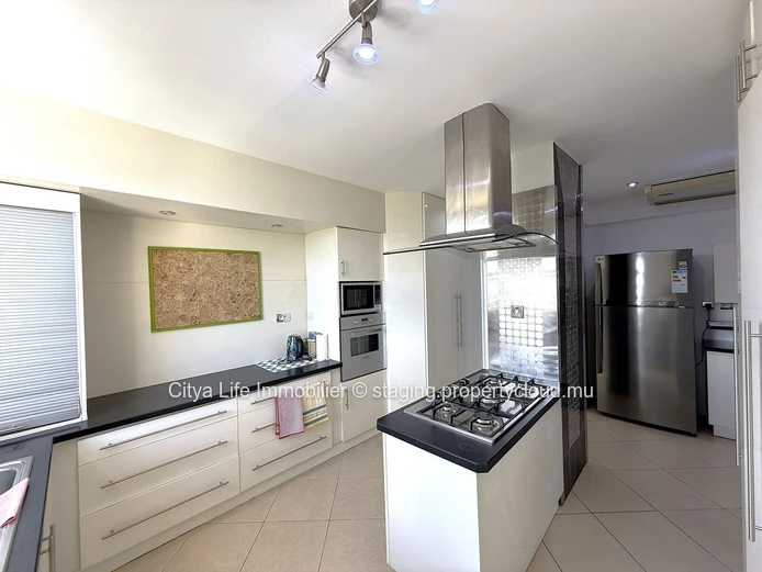 Luxurious 4-Bed penthouse in Quatre Bornes with Rooftop Access & Mountain Views.