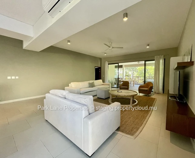 Beach access is just a short stroll from this lovely property.