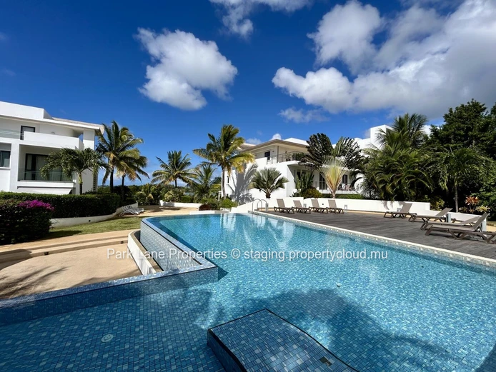 Luxurious Beachfront Apartment with Stunning Views and Communal Pool in Haute Rive, $800K