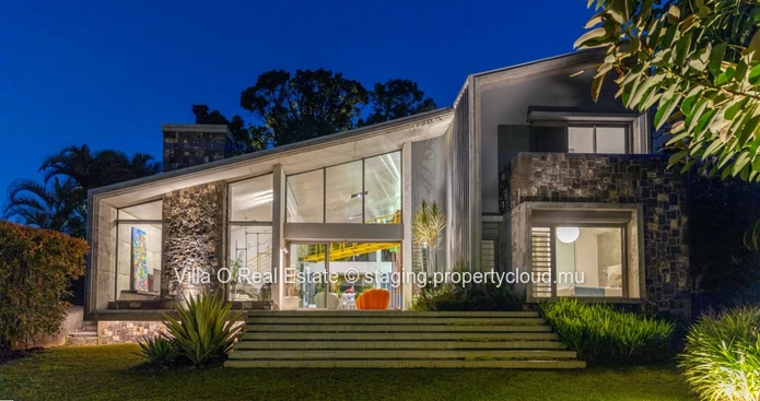 Nestled in the heart of Floreal, this architectural gem offers a modern lifestyle with an omnipresent nature that ill... (Sole Mandate)