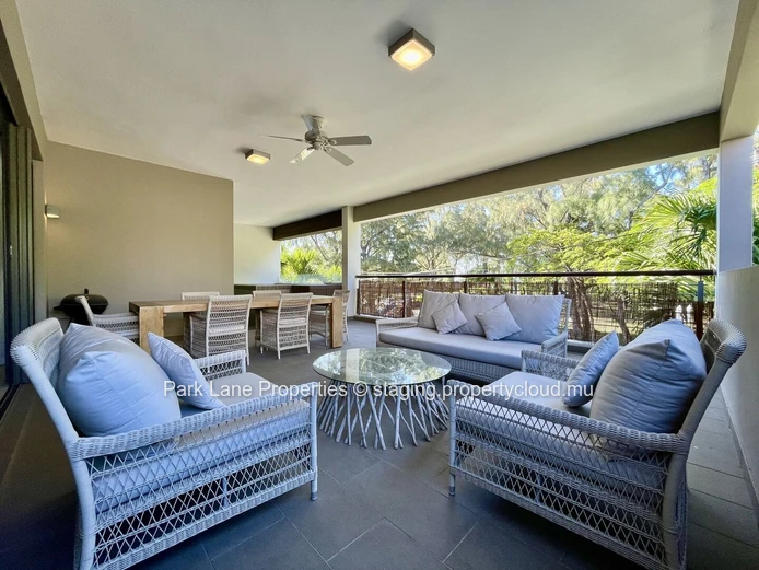 Beach access is just a short stroll from this lovely property.