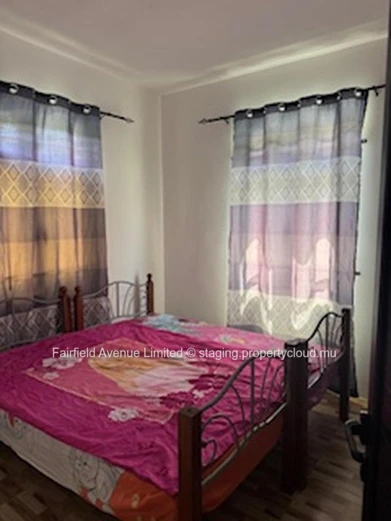 "Charming Furnished Apartment in Calodyne with Parking, Garden, and Close to Amenities - Rs 22,500"
