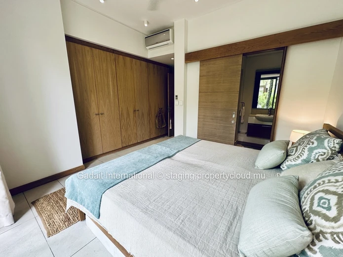 Appartement de Prestige à Montchoisy – Luxe, Sérénité et Accès Direct à la Plage