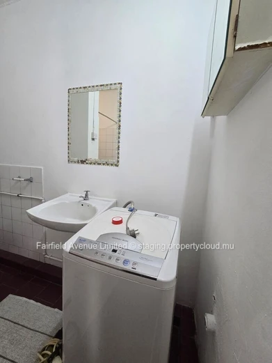 Modern Furnished Apartment in Rose Hill with Guarded Parking, Balcony, and Close to Schools and Shops - Rs 20,000/mo.