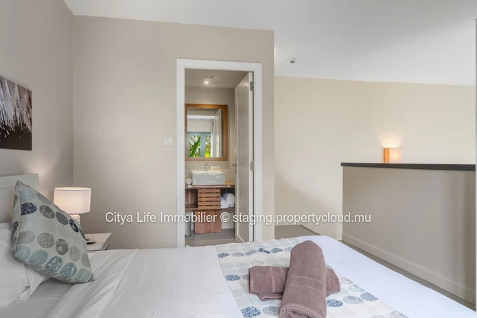 Modern Apartment with Communal Pool in Trou aux Biches - Spacious and Stylish Living for Rs