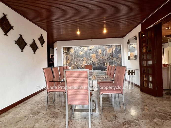 Double-storey home overlooking a magnificent pool and mature trees in Floreal