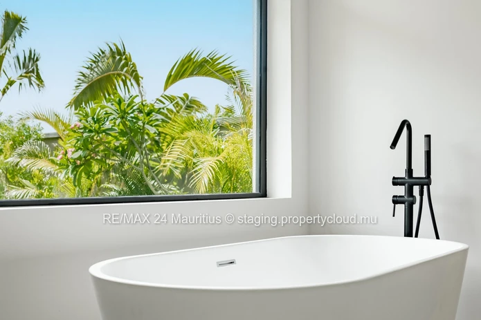 Luxurious Tropical Living in Tamarin: Exquisite 4-Bedroom Villa in Ekô Savannah Resort