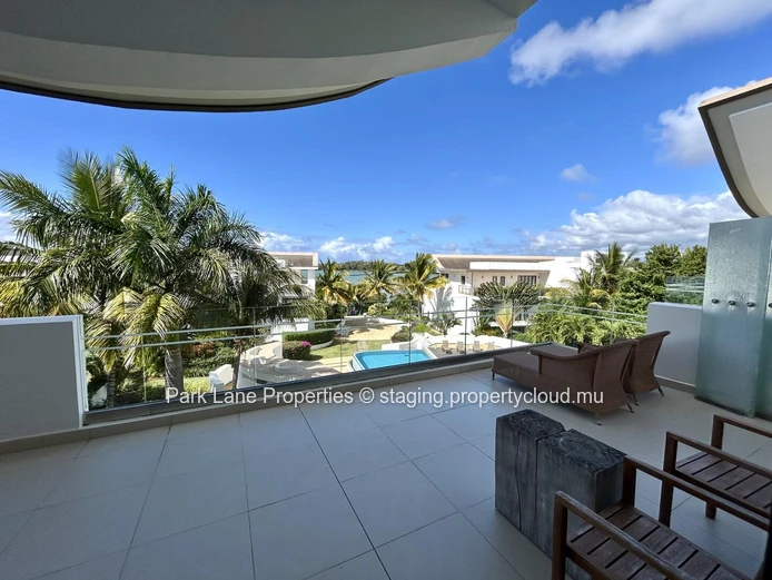 Luxurious Beachfront Apartment with Stunning Views and Communal Pool in Haute Rive, $800K