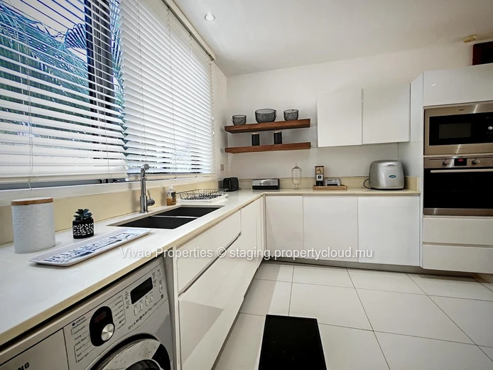 Apartment for sale in the heart of the Marina in Rivière Noire - Black River, 3 bedrooms, river and mountain views, c...