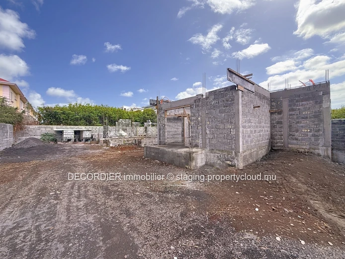 Elegant villa under construction with pool & garden