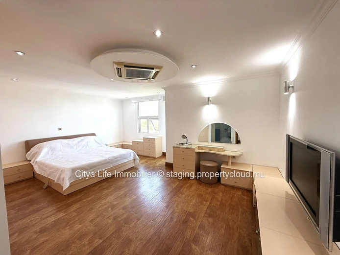 Luxurious 4-Bed penthouse in Quatre Bornes with Rooftop Access & Mountain Views.
