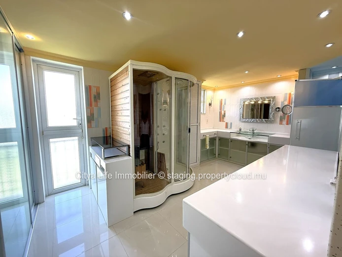 Luxurious 4-Bed penthouse in Quatre Bornes with Rooftop Access & Mountain Views.