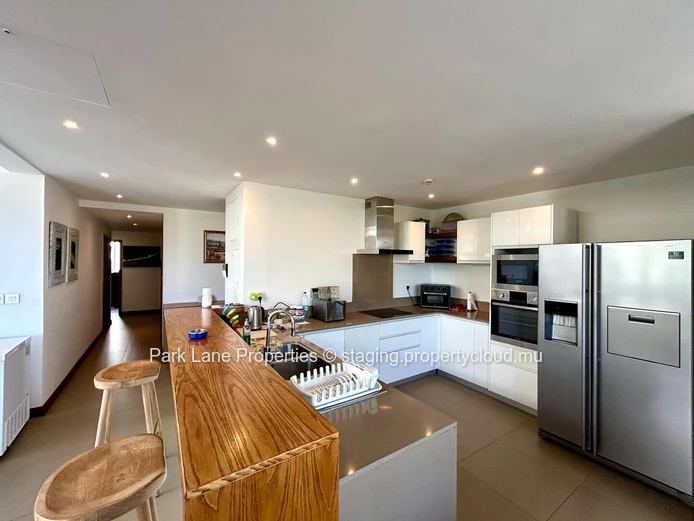 Luxurious Beachfront Apartment with Stunning Views and Communal Pool in Haute Rive, $800K
