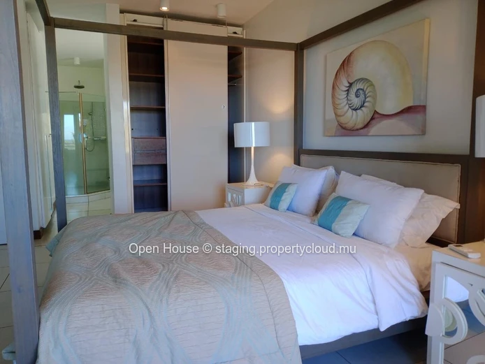 Superb beachfront Penthouse for sale in Pointe aux Biches, 3 bedrooms, communal pool, price Rs 28M. Don't miss out!