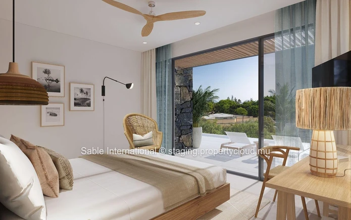 Appartement de luxe en bord de mer avec une vue imprenable sur la mer et des équipements de style resort à Flic en Flac