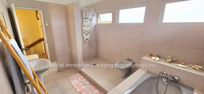 Charming unfurnished family house of 325 m2 on a plot of land of 93 toises, ideally located in a quiet residential ar...